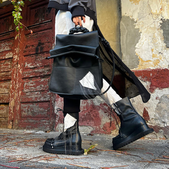 Braided with Love XOXO black and white leather lace-up booties