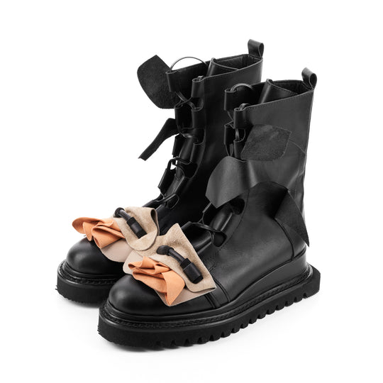 Light is my Accomplice black leather booties