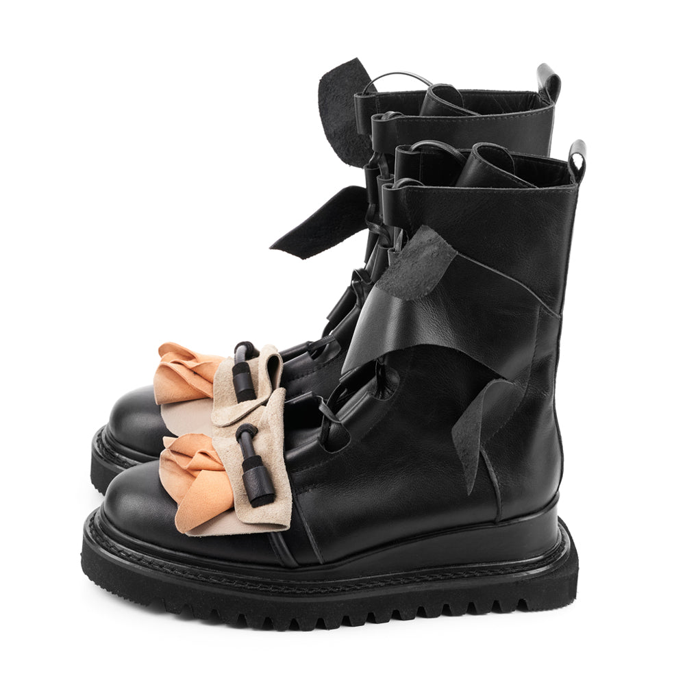 Light is my Accomplice black leather booties