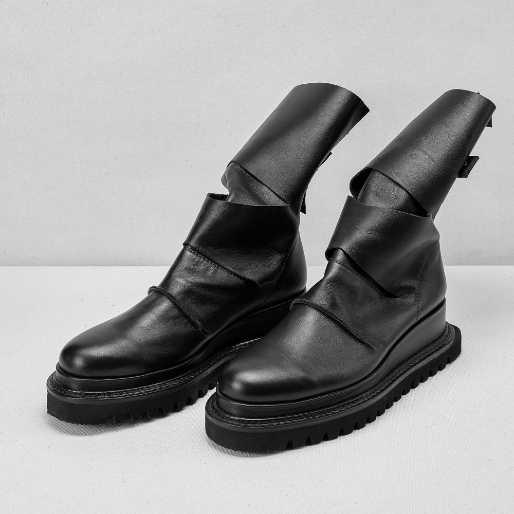 Smooth black leather cut-out booties