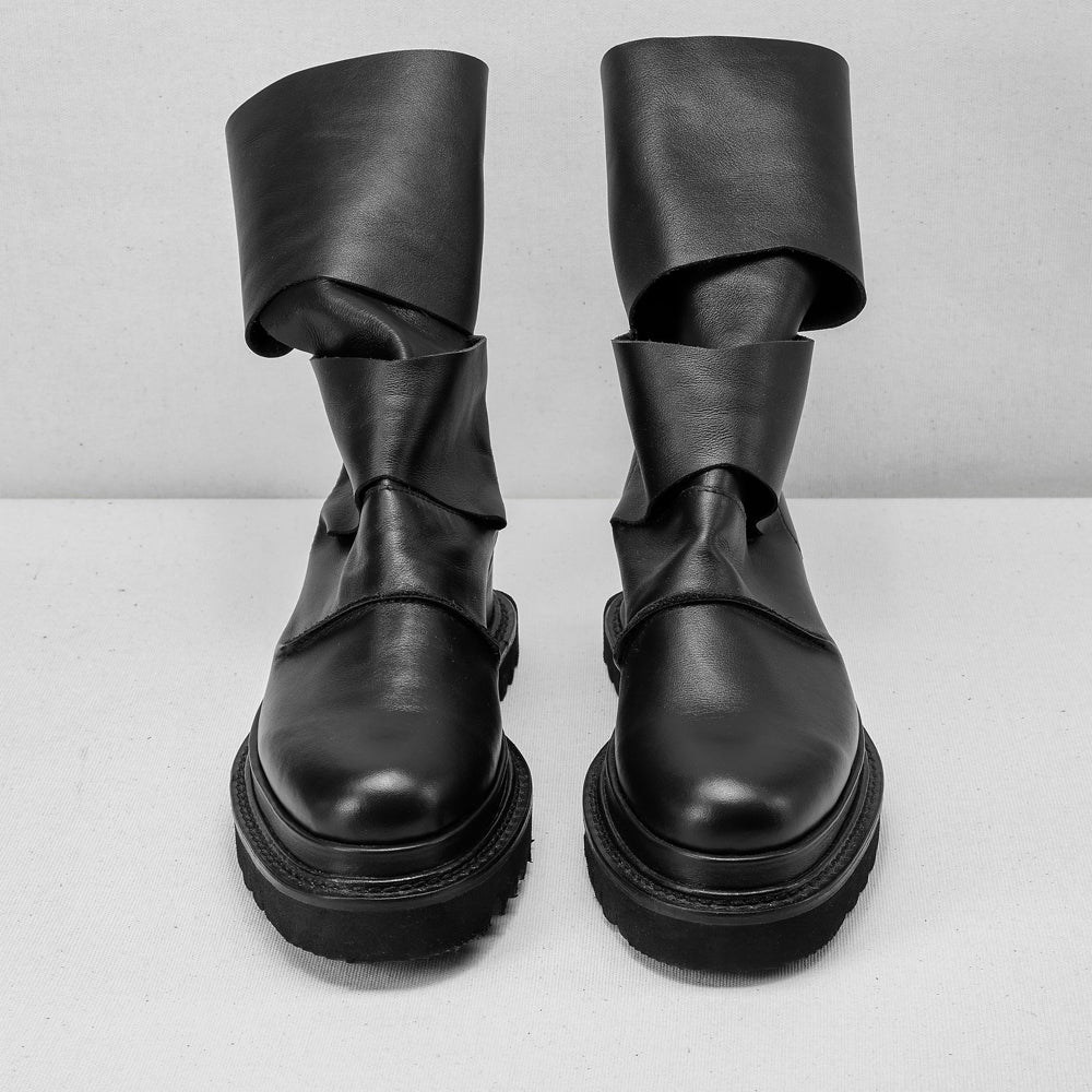 Smooth black leather cut-out booties
