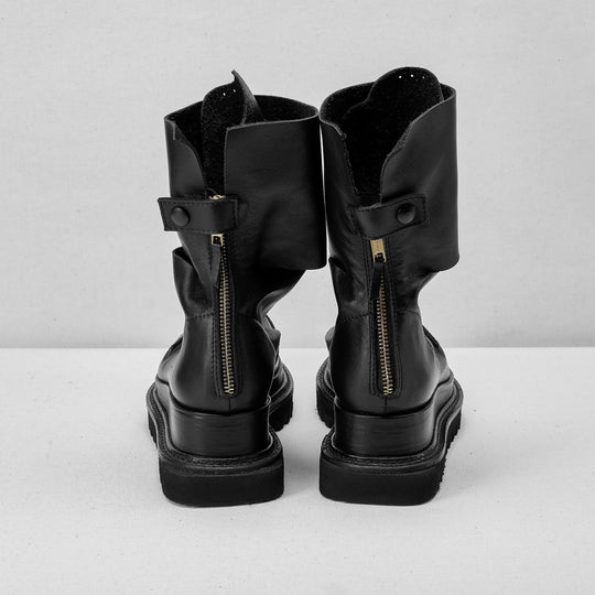 Smooth black leather cut-out booties