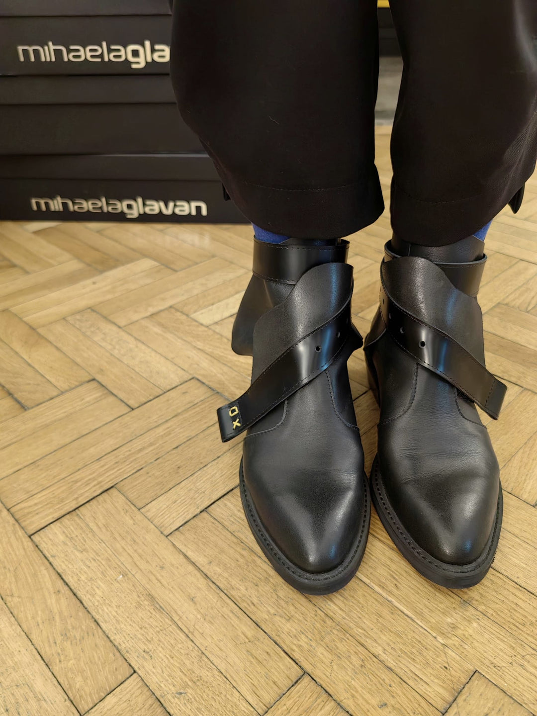 XOXO Paper Game black leather booties