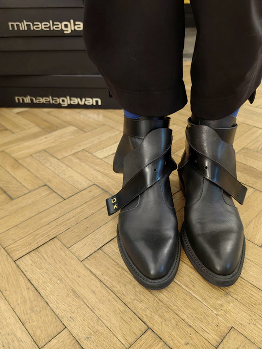 XOXO Paper Game black leather booties