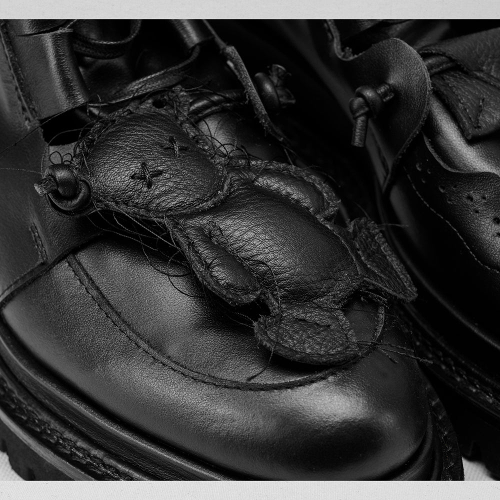 Why so Serious black leather lace-up booties