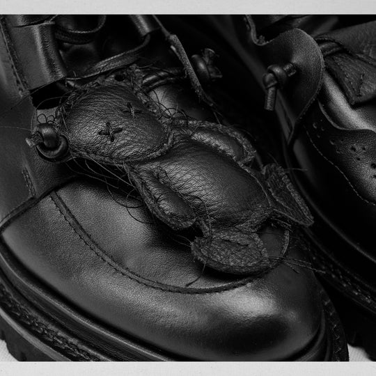 Why so Serious black leather lace-up booties