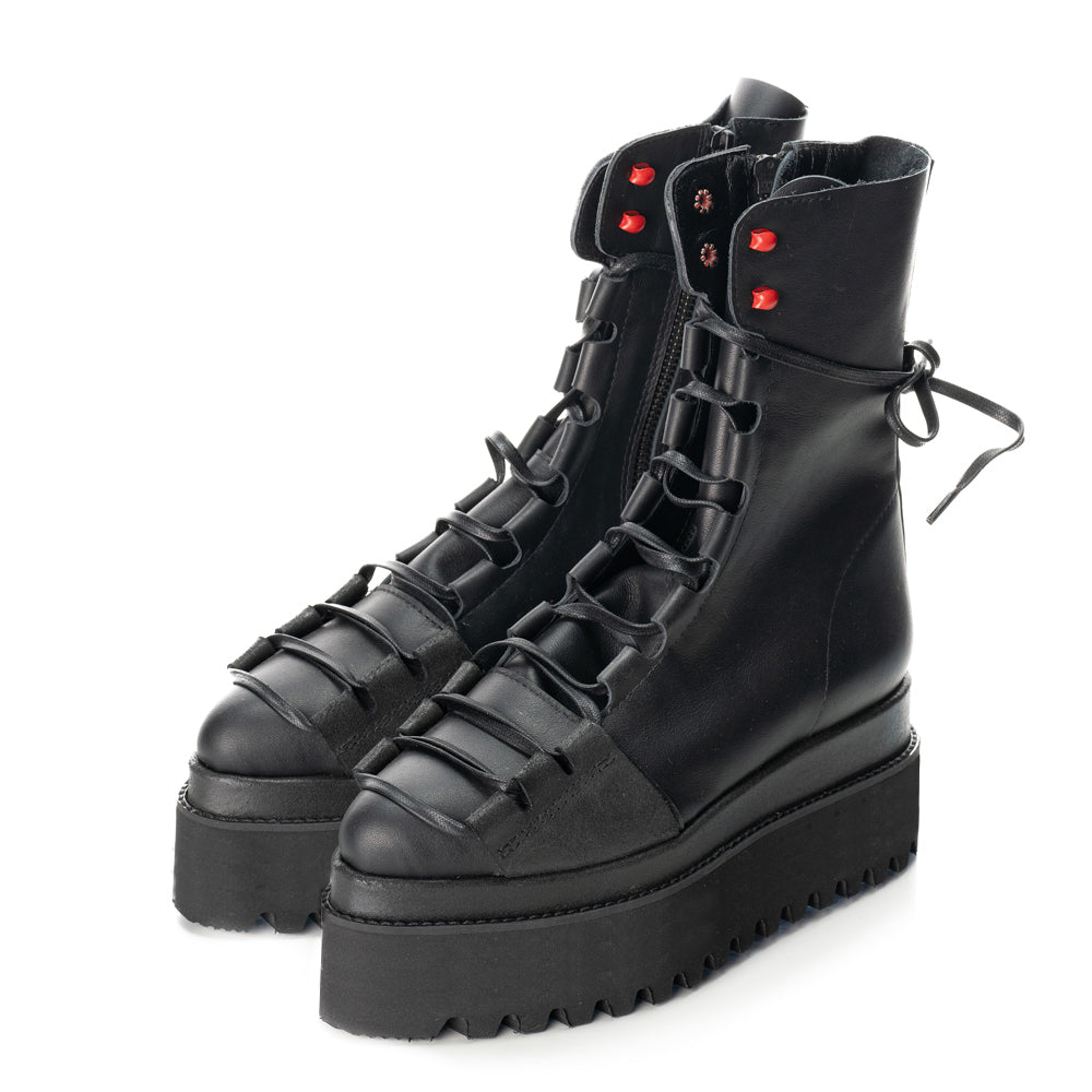 Laces Affair and Red Dots combat booties Bold textures and