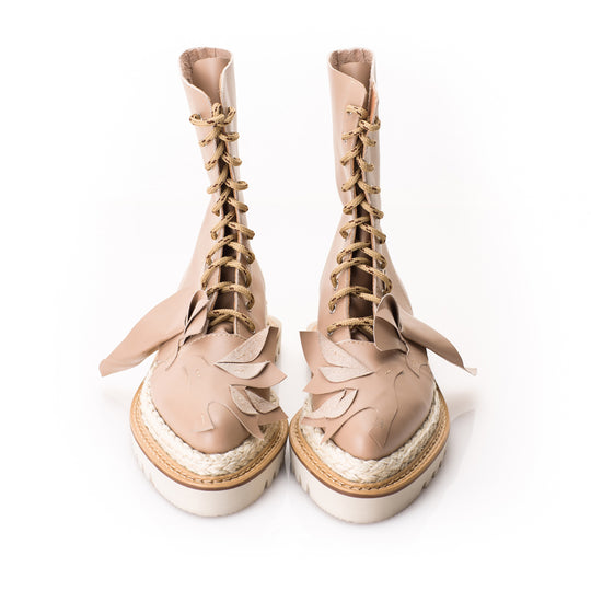 Handcrafted boots, romantic details