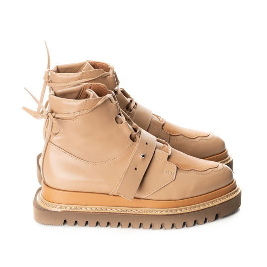 Flat platform designer boots