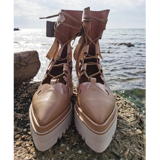 .Lace-up platform boots for added style