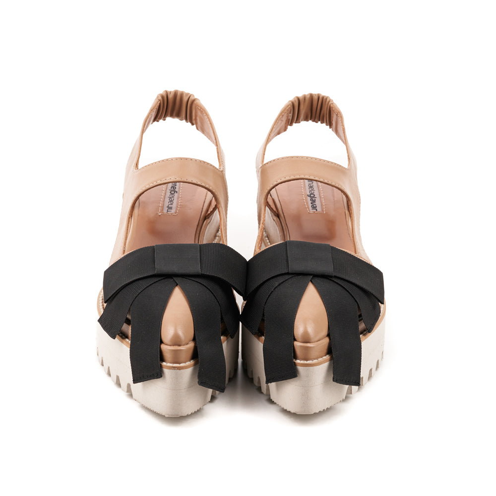 A Promise beige leather black bow shoes