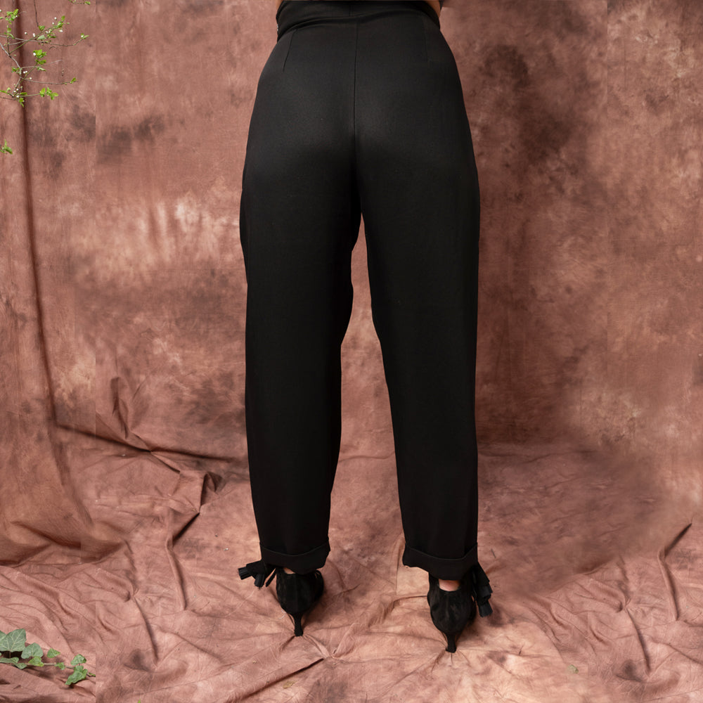 Evening Twist black lyocell satin balloon trousers