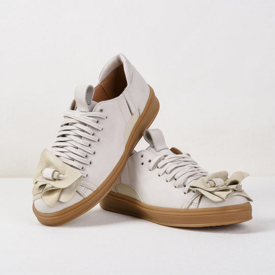 Hypnotize Us light grey nubuck low-top sneakers