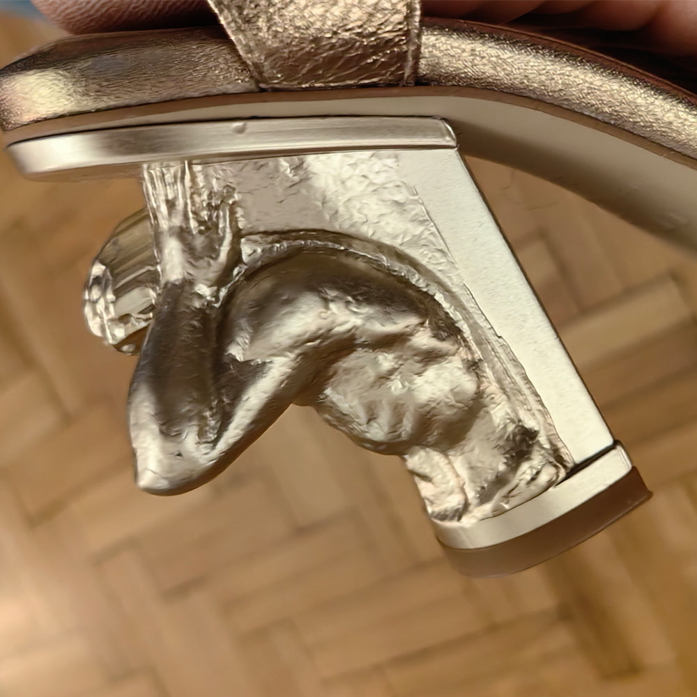 In your Arms golden leather sandals