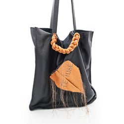 Paper Thoughts black leather tote bag