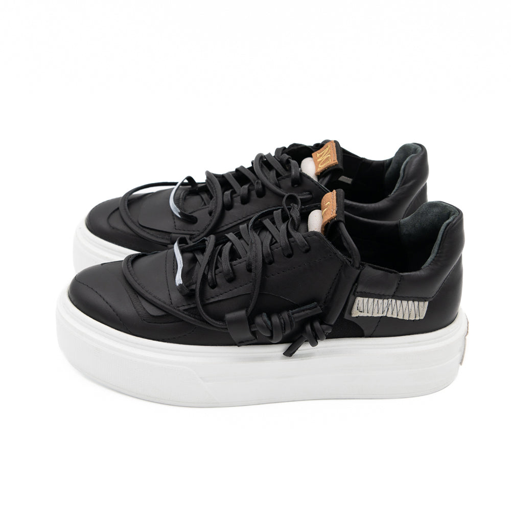 Remake of Us black leather low - top sneakers