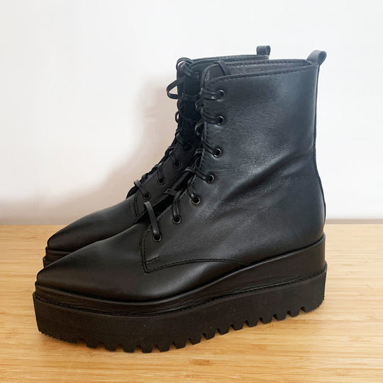 Sustainable Selection- Sharp Love black leather booties with metallic accessories