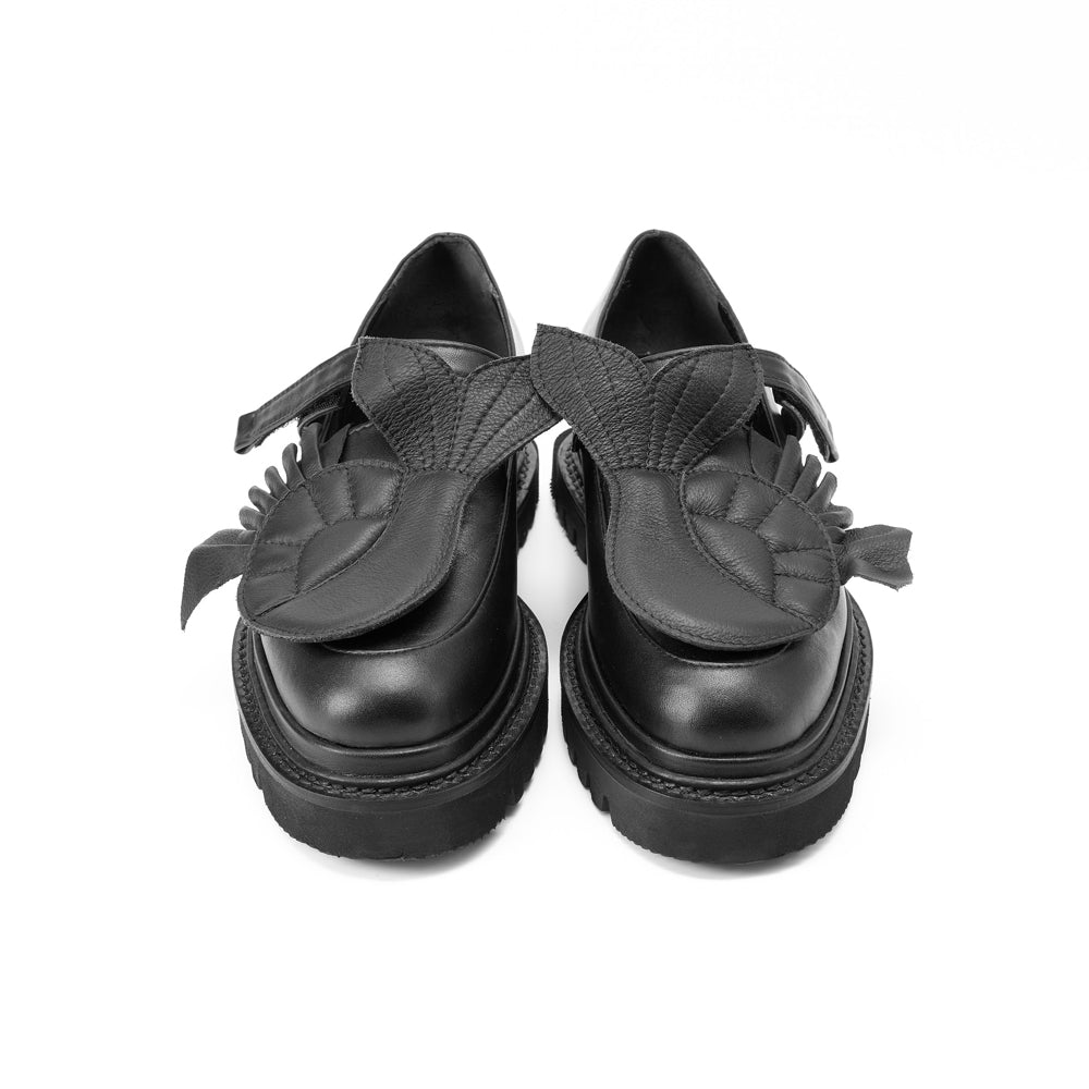 The Answer Within black leather loafers