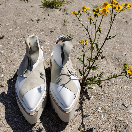 White leather covered flat platform, beige sole