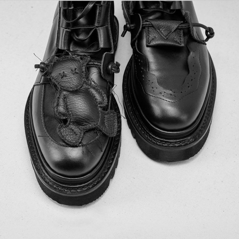 Why so Serious black leather lace-up booties