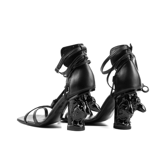 X-quisite black leather sandals