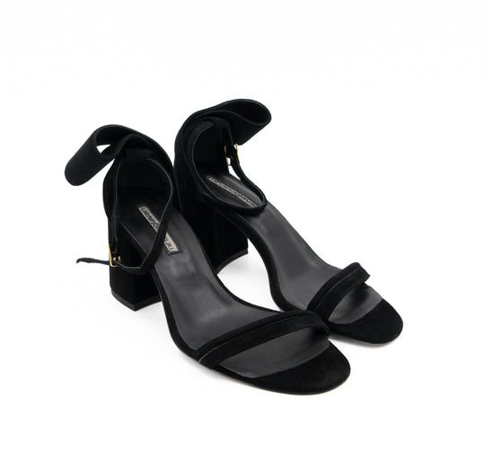 Back to Bow black suede sandals, opposite three-quarter view showing the open toes and gold-tone buckles.