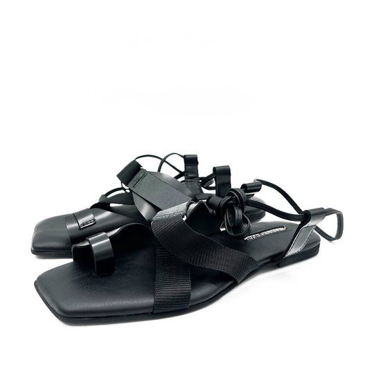 Cover Me In Sunrise black leather sandals