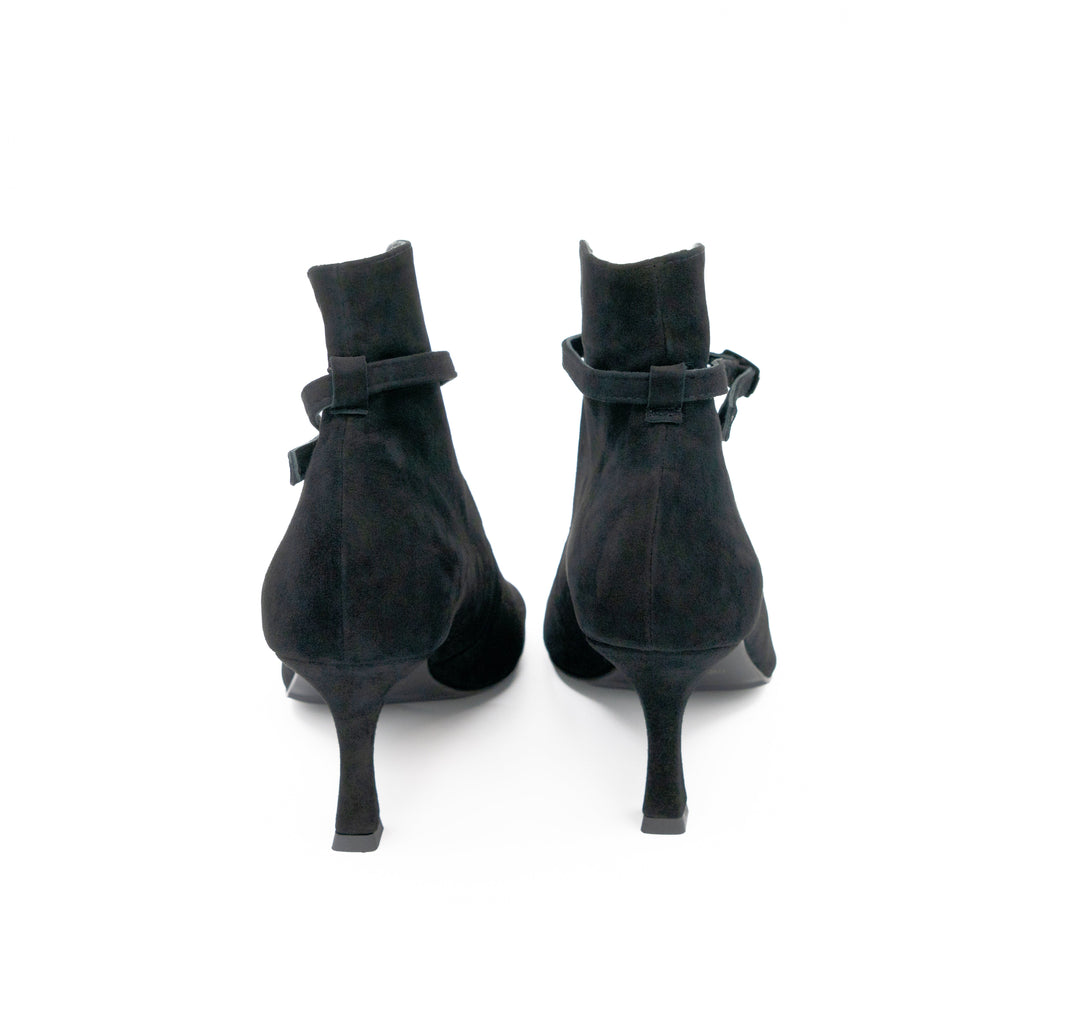Meet Me Tonight black suede booties by Mihaela Glavan, back view showing the suede heel panels and slender heels.