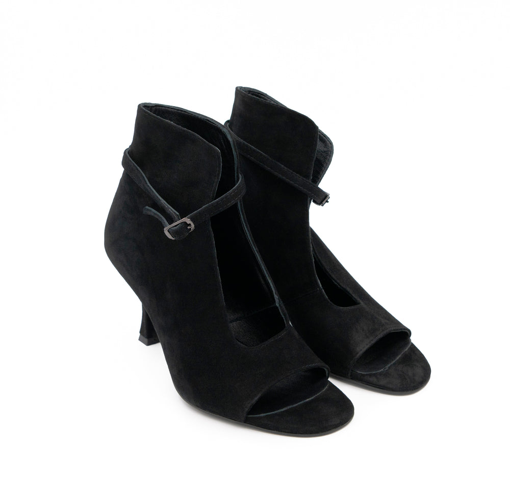 Meet Me Tonight black suede booties by Mihaela Glavan, opposite three-quarter view showing the black suede and silver-tone buckles.