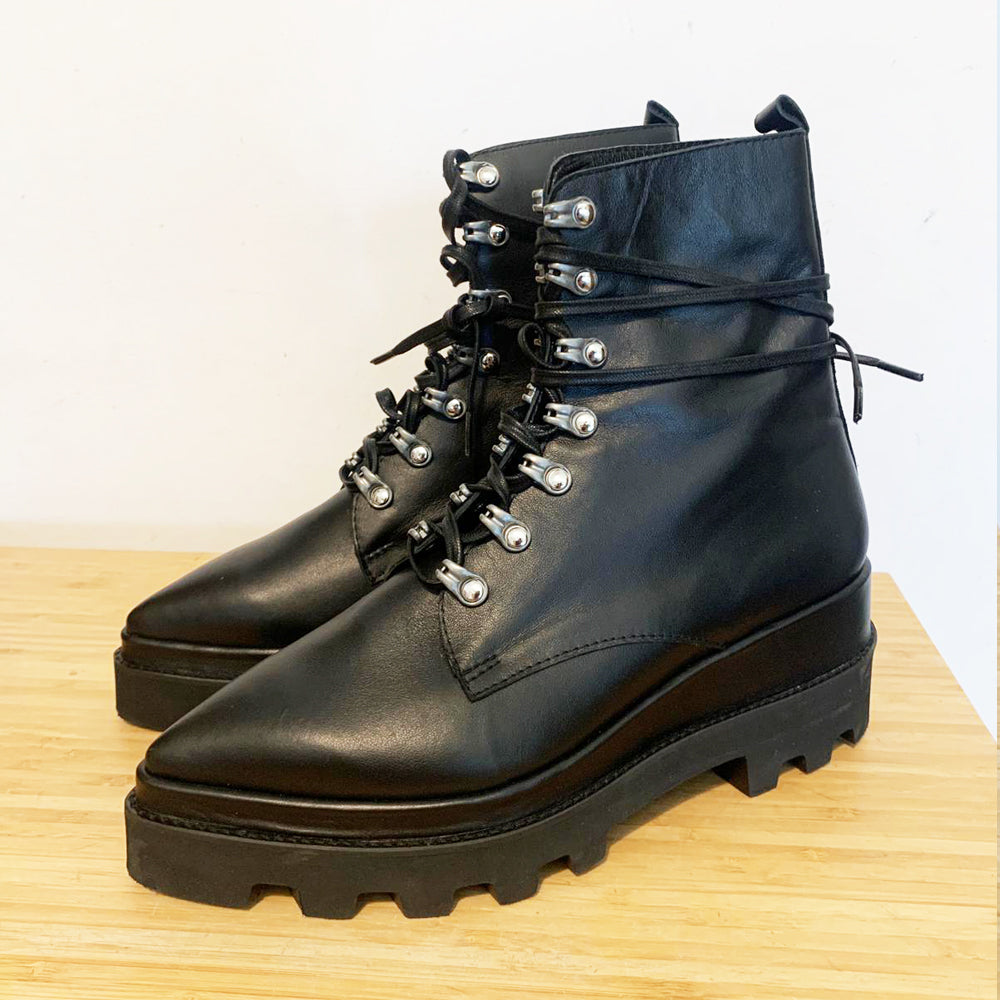 Sustainable Selection- Sharp Love black leather booties with metallic accessories