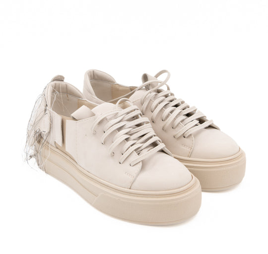Teddy Soul light beige nubuck low-top sneakers by Mihaela Glavan, three-quarter view from above showing the laces and beige soles.
