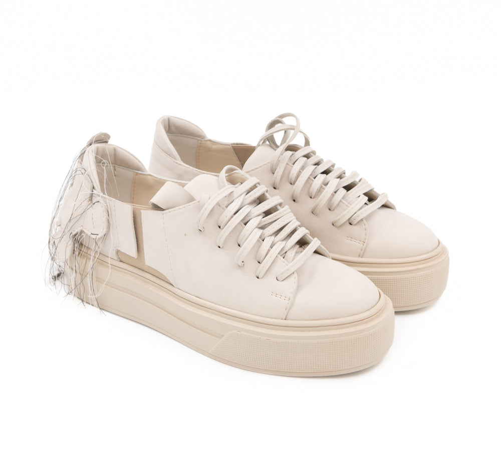 Teddy Soul light beige nubuck sneakers by Mihaela Glavan, three-quarter view showing the quilted bear detail and beige soles.