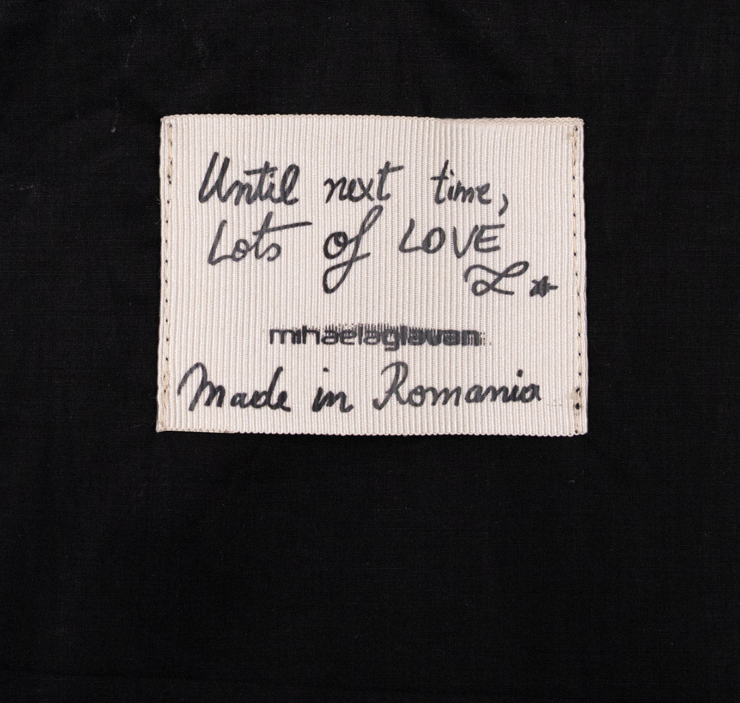 Mihaela Glavan label supplied with the Teddy beige textile totebag, with handwritten-style lettering and Made in Romania text.
