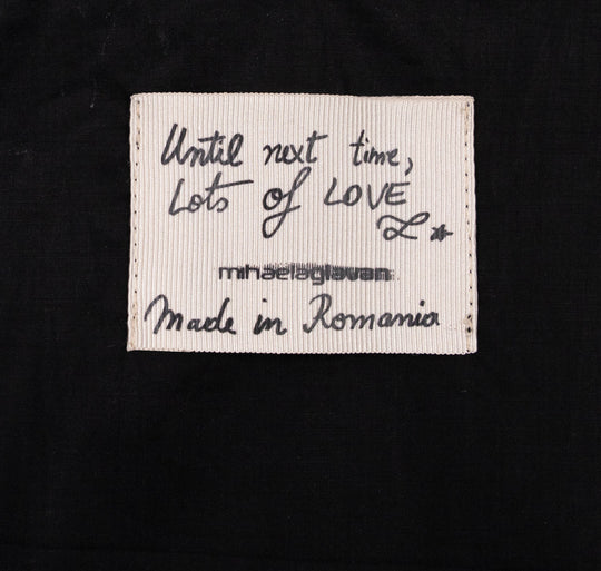 Mihaela Glavan label supplied with the Teddy beige textile totebag, with handwritten-style lettering and Made in Romania text.