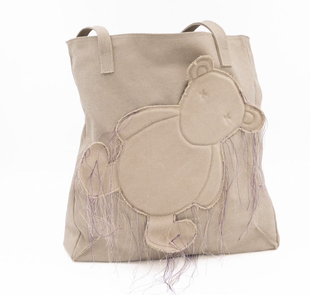 Teddy vegan beige textile totebag showing the bear applique and shoulder handles, front view.