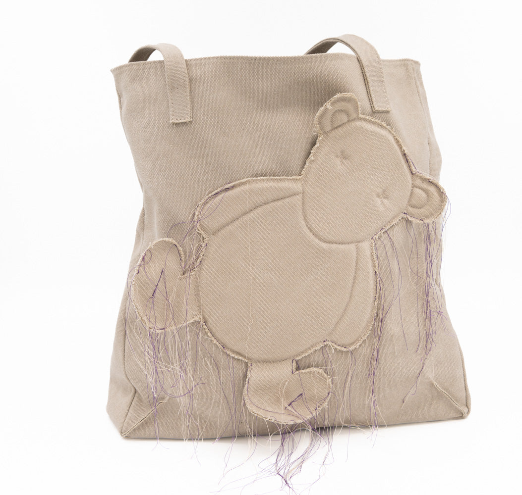 Teddy vegan beige textile totebag showing the bear applique and shoulder handles, front view.