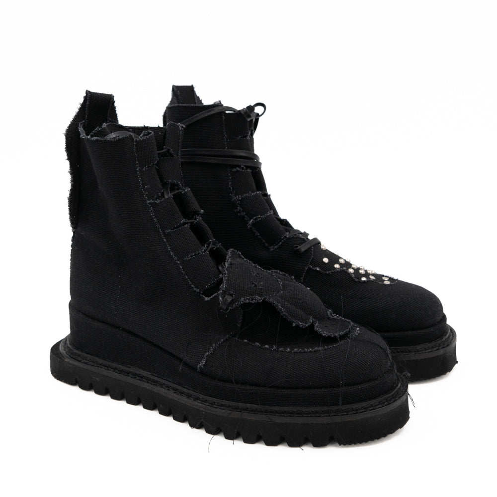 Teddy Vegan black canvas lace-up booties by Mihaela Glavan, opposite three-quarter view of the black canvas upper and quilted bear.