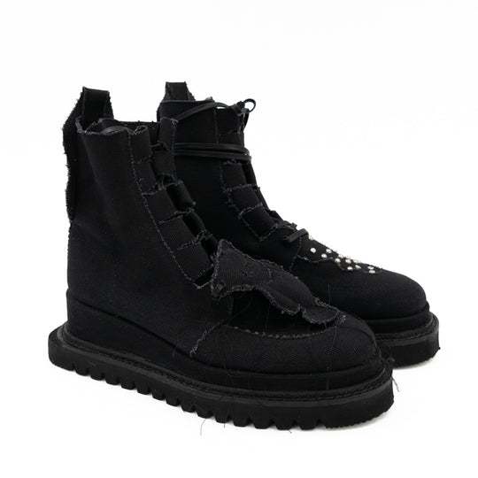Teddy Vegan black canvas lace-up booties by Mihaela Glavan, opposite three-quarter view of the black canvas upper and quilted bear.
