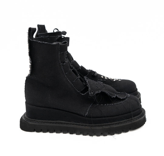 Teddy Vegan black canvas lace-up booties by Mihaela Glavan, side view showing the raised canvas bear and geometric sole.