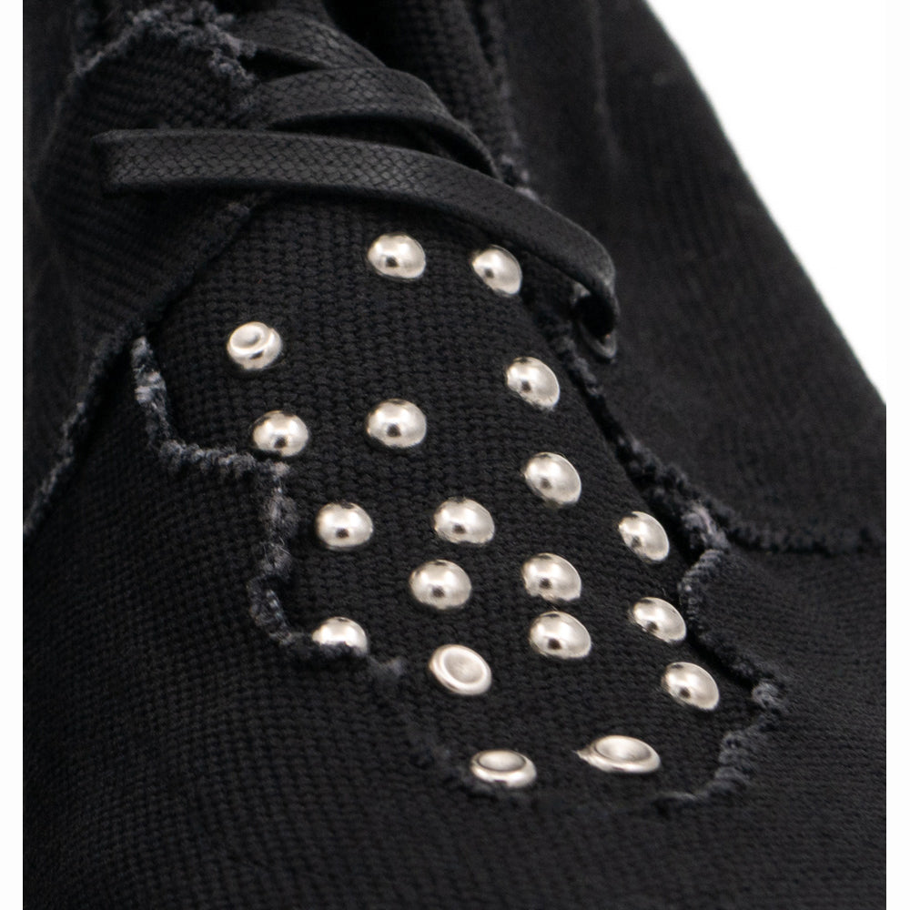 Teddy Vegan black canvas lace-up booties by Mihaela Glavan, close-up of the metal studs on the black canvas.