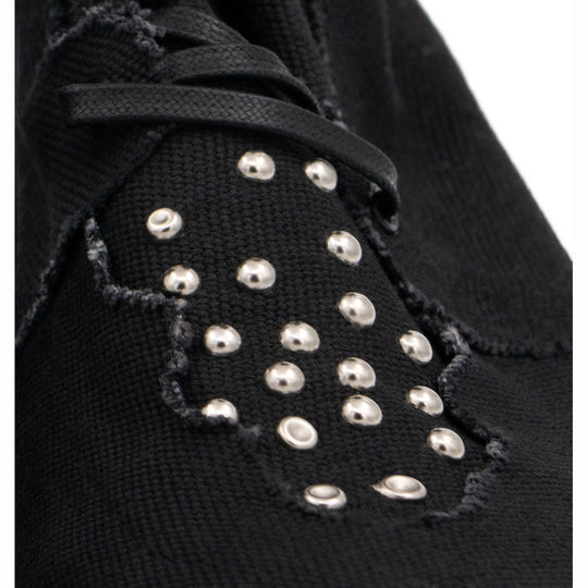 Teddy Vegan black canvas lace-up booties by Mihaela Glavan, close-up of the metal studs on the black canvas.