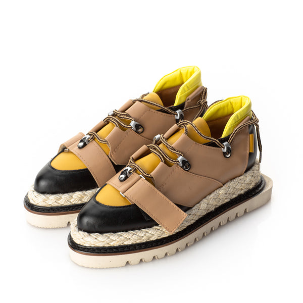 Beige and yellow leather shoes with jute-covered flat platform, beige sole and black detail