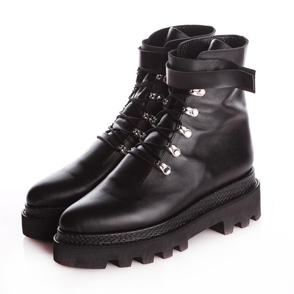 Black leather lace-up booties with silver accessories