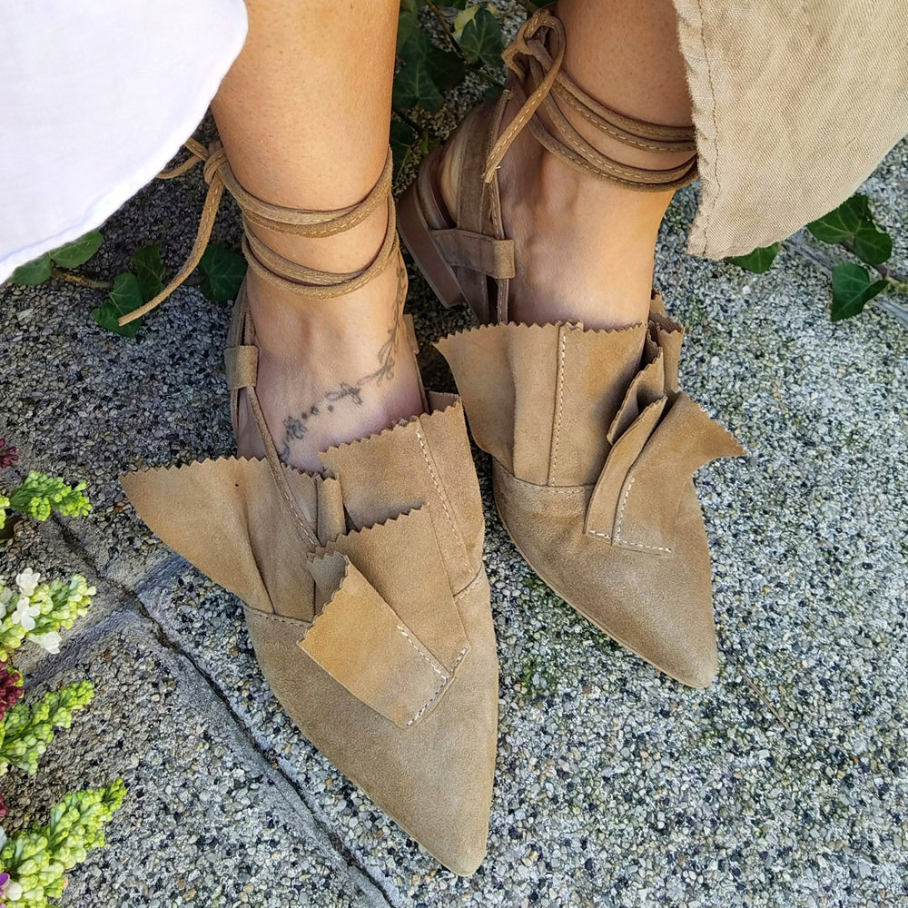 Beige suede ballerinas with floral inspiration details, beige sole and 2 cm heels