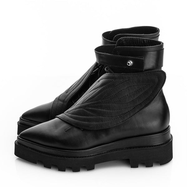 Lace up minimalist stylish boots