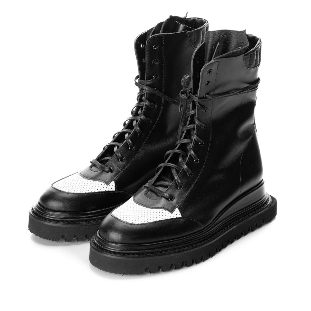 Boho black leather flat platform boots with organic inspiration detail