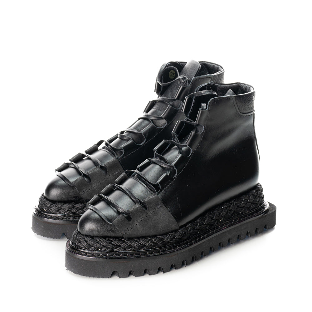 Black leather lace-up booties with flat platform covered with black jute leather