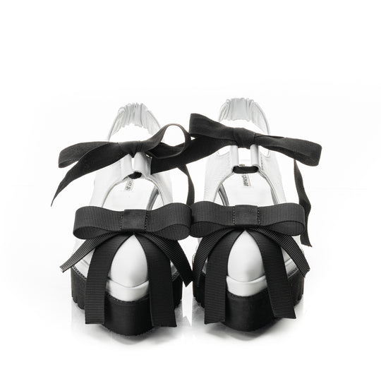 White leather cut-out shoes with ribbed textile bow details