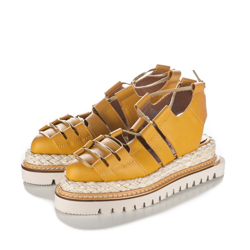 Yellow leather flat platform shoes with beige sole