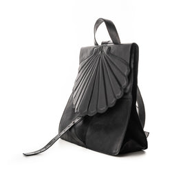 Chapter 1: Sunny Accomplice black leather backpack